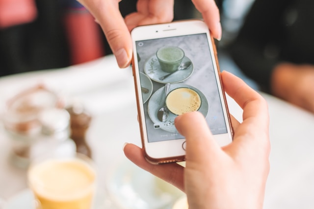 Person using coffee app on phone